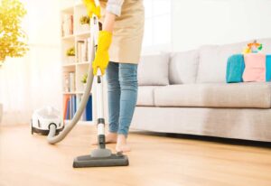 house cleaner vacuuming